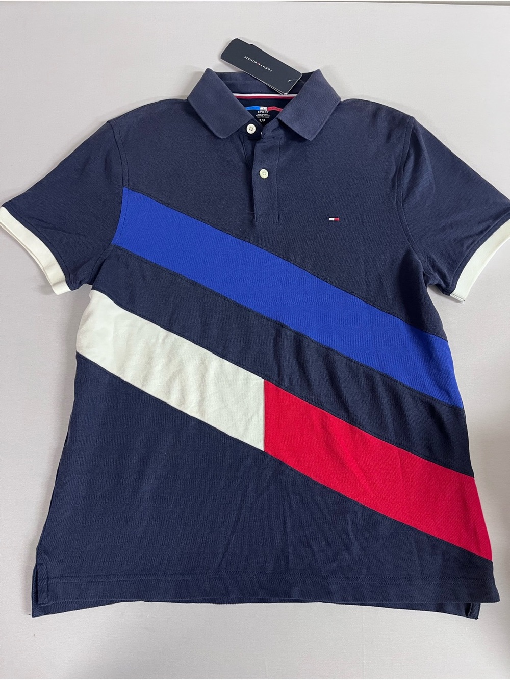 Brand New-Tommy Hilfiger Men’s Navy Sport Polo with Blue/White/Red Colorblocks